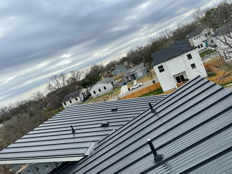 Standing seam metal roof panels with vents for Skylight Repair in Zionsville